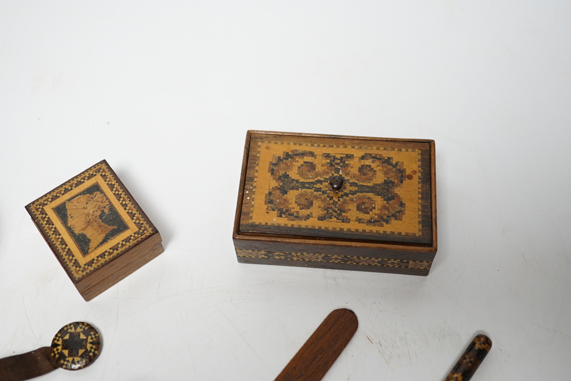 Tunbridgeware - six items including a stickware sovereign case, Victoria profile stamp box, two bookmarks, nib pen, and a small box and cover